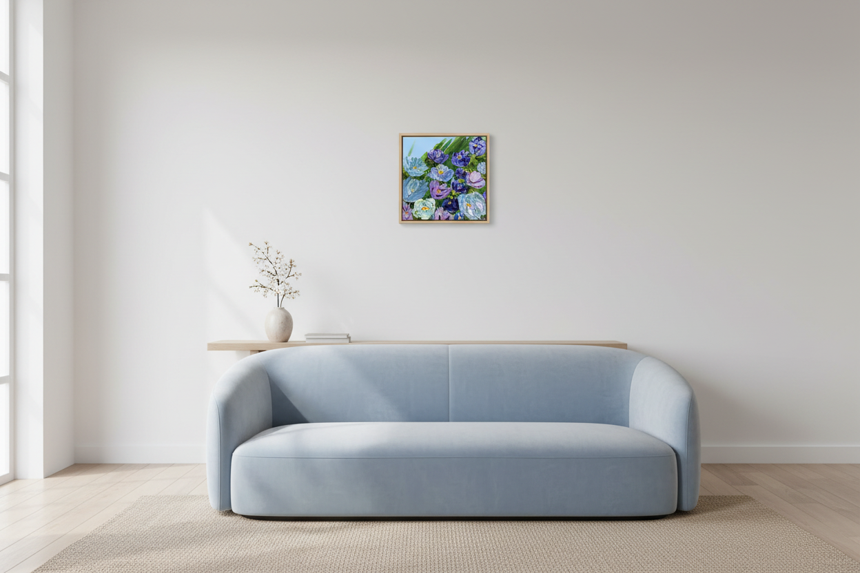 Tender Moments Abound - 12x12 floral impasto acrylic painting displayed in a bright modern living room with powder blue sofa
